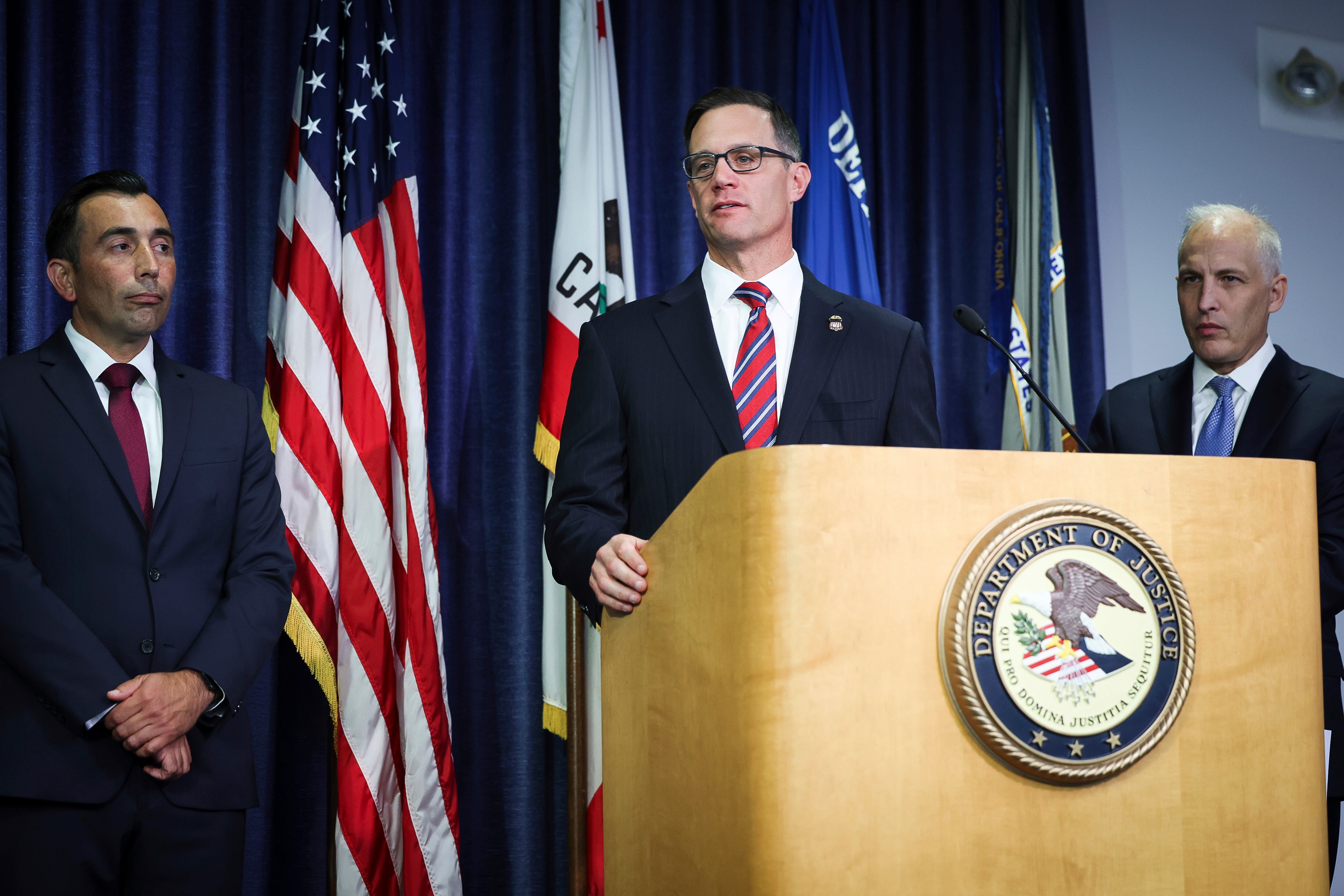 U.S. Attorney Randy S. Grossman for the Southern District of California, center, speaks during a press conference at the U.S. Attorney's Office for the Southern District of California on Thursday, Aug. 3, 2023, in San Diego.