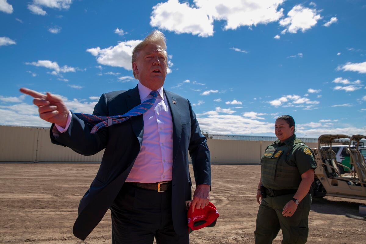 President Donald Trump speaks as he visits a new section of the border wall with Mexico in Calexico, Calif.