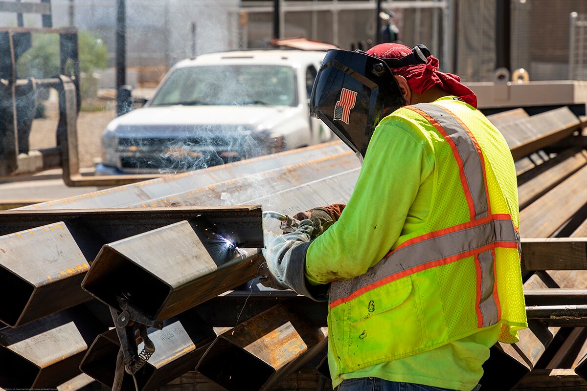 U.S. Army Corps of Engineers contractors place rebar at footing of retaining walls on June 20, 2019,